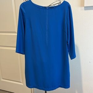 Tildon 3/4 sleeve, open back dress. Size M. Has 2 side pockets.